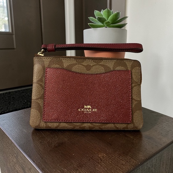 Coach Handbags - Coach Signature Wristlet with Front Pocket - EUC